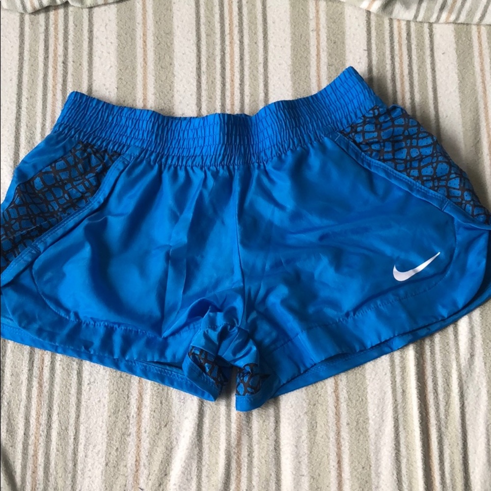 NIKE running shorts blue and black pattern